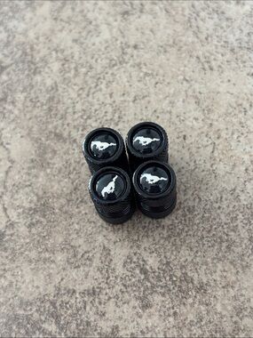 Black Mustang Logo Tire Valve Stem Caps - 4-Pack